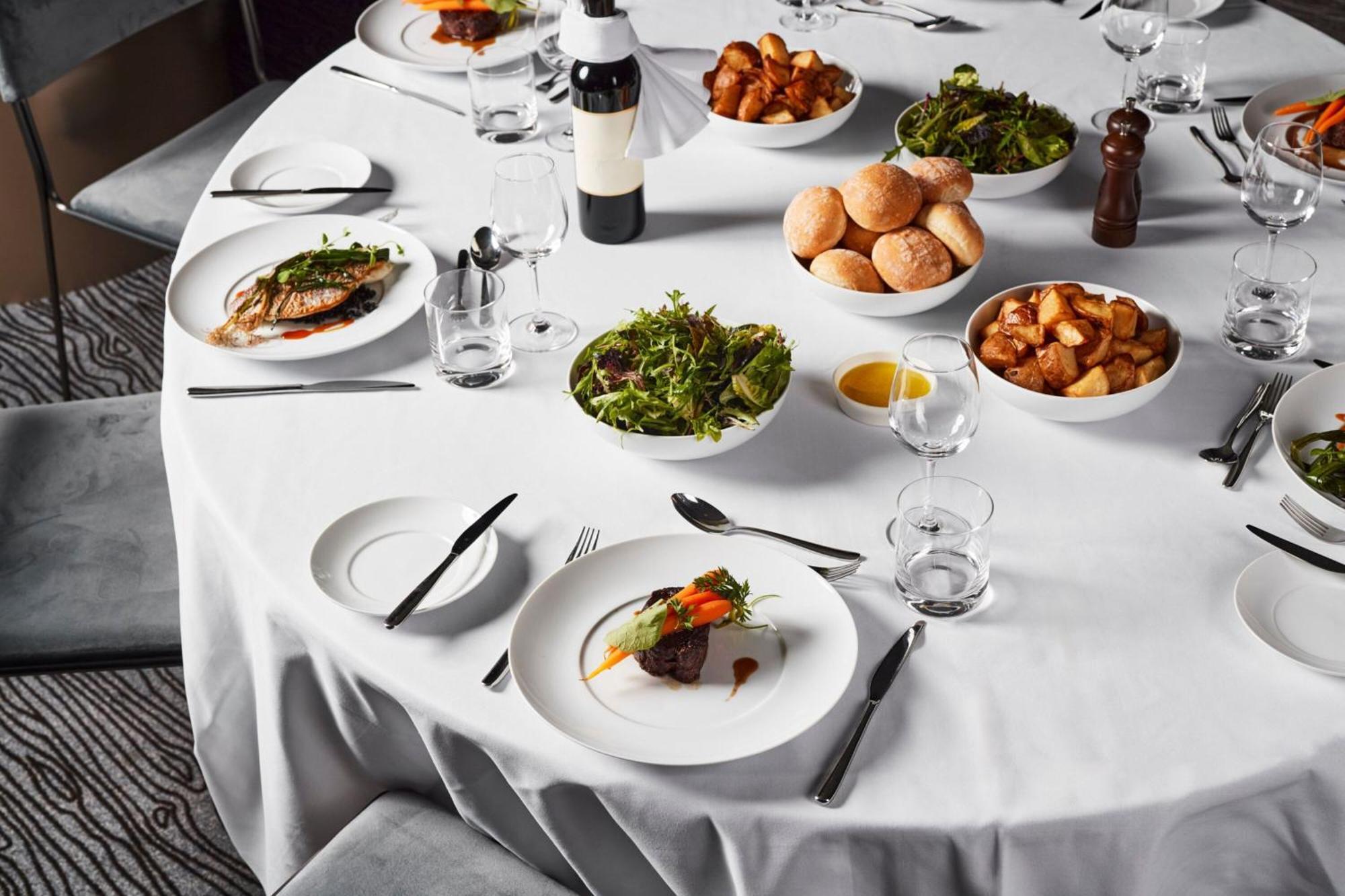 Melbourne Marriott Hotel Docklands Exteriör bild A table set for a formal dinner